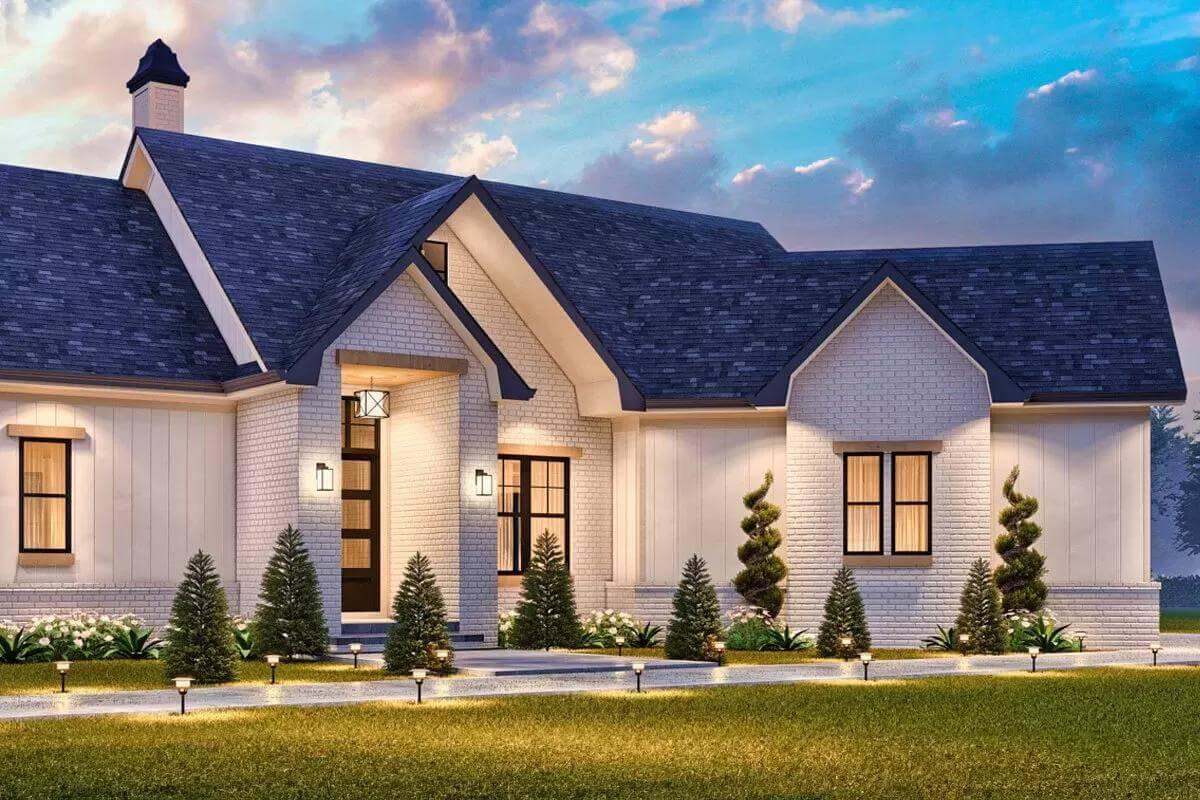 Notice the Artful Landscaping and Warm Lighting in This Craftsman Facade