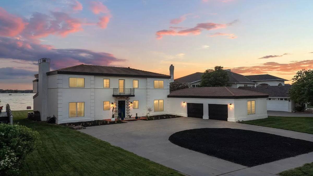 Evening Elegance with Lake Views and Classic Spanish Tile Roof