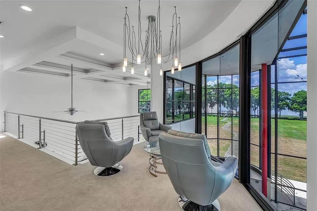 Relaxation with a View: Check Out This Glass-Enclosed Lounge Area