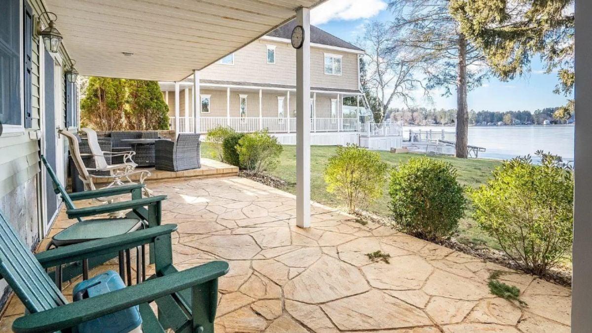 Relax on the Stone Patio Overlooking Tranquil Waters