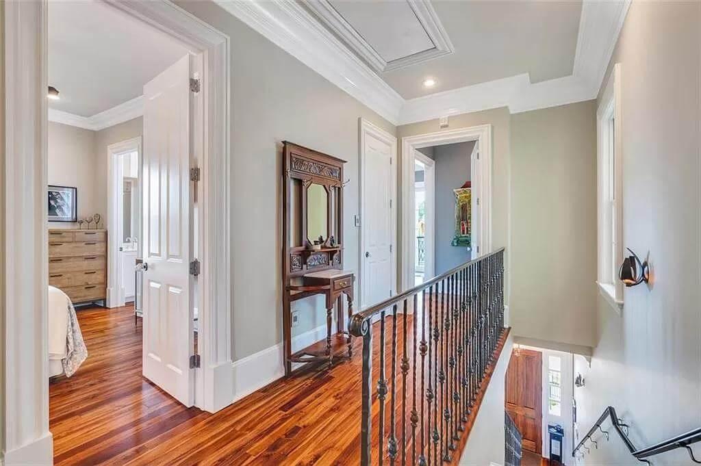 Notice the Intricate Wood Detailing in This Upper Hallway