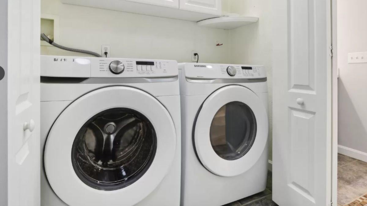 Streamlined Laundry Nook with Modern Appliances