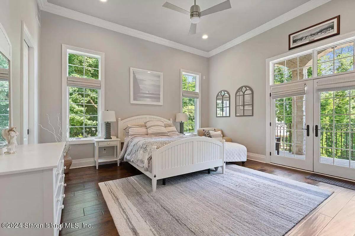 Wake Up to Scenic Views in This Bedroom With French Doors