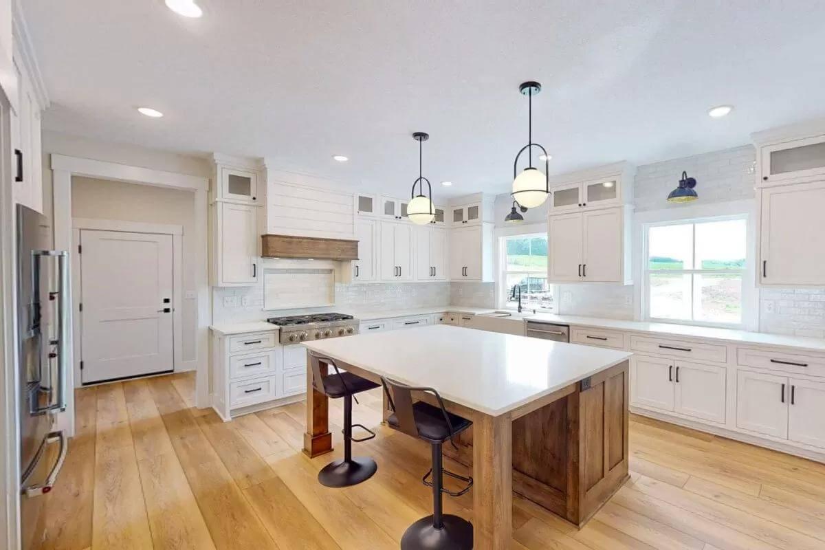 Farmhouse Kitchen with a Huge Island and Rustic Touches