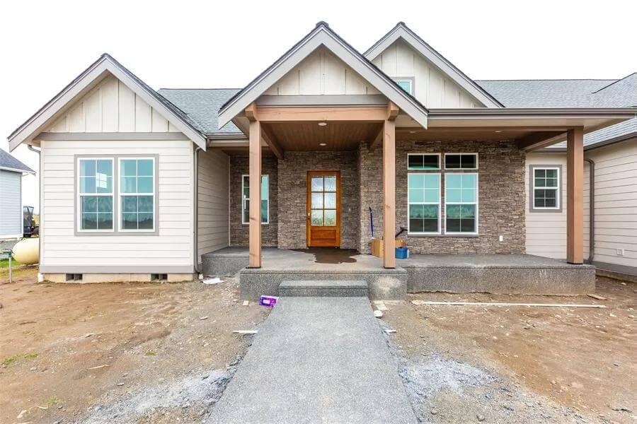 Step Up to This Craftsman Entry with Stone Details and Wooden Accents