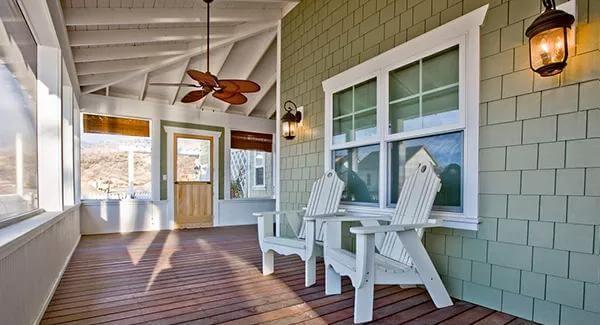 Relax on This Craftsman Porch with Shingle Siding and Classic Adirondack Chairs