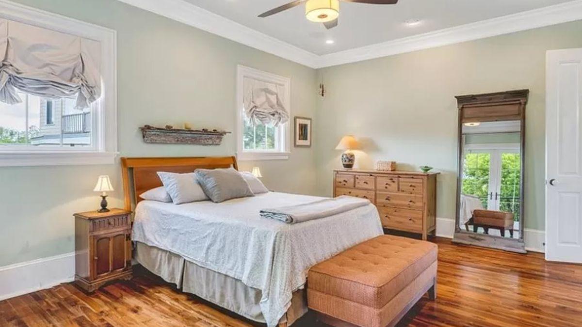 Relax in This Peaceful Bedroom with Soft Mint Walls and Vintage Touches