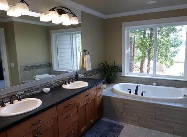 Modern Craftsman Bathroom with a Relaxing Garden View Soaker Tub
