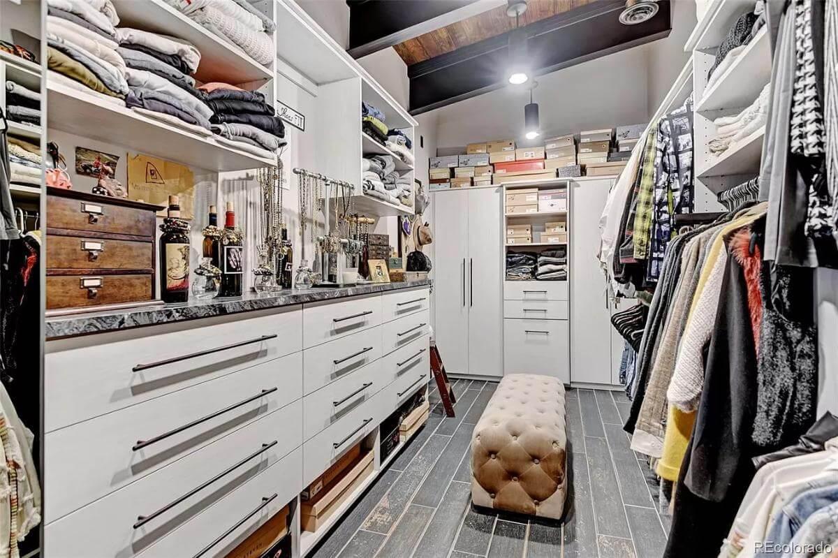 Luxurious Walk-In Closet with Marble-Topped Storage