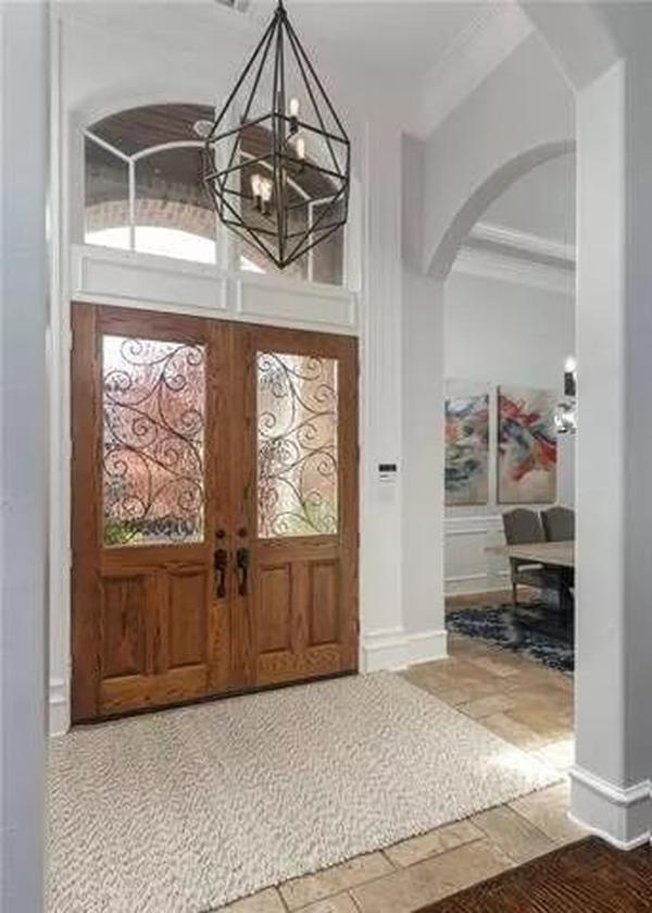 Step Inside to See These Elegant Wooden Doors with Intricate Glass