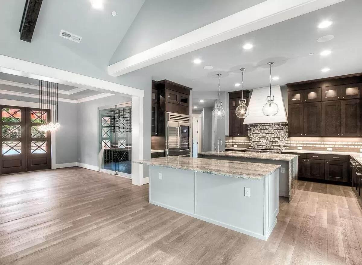 Notice the Stunning Pendant Lights in This Sleek Craftsman Kitchen