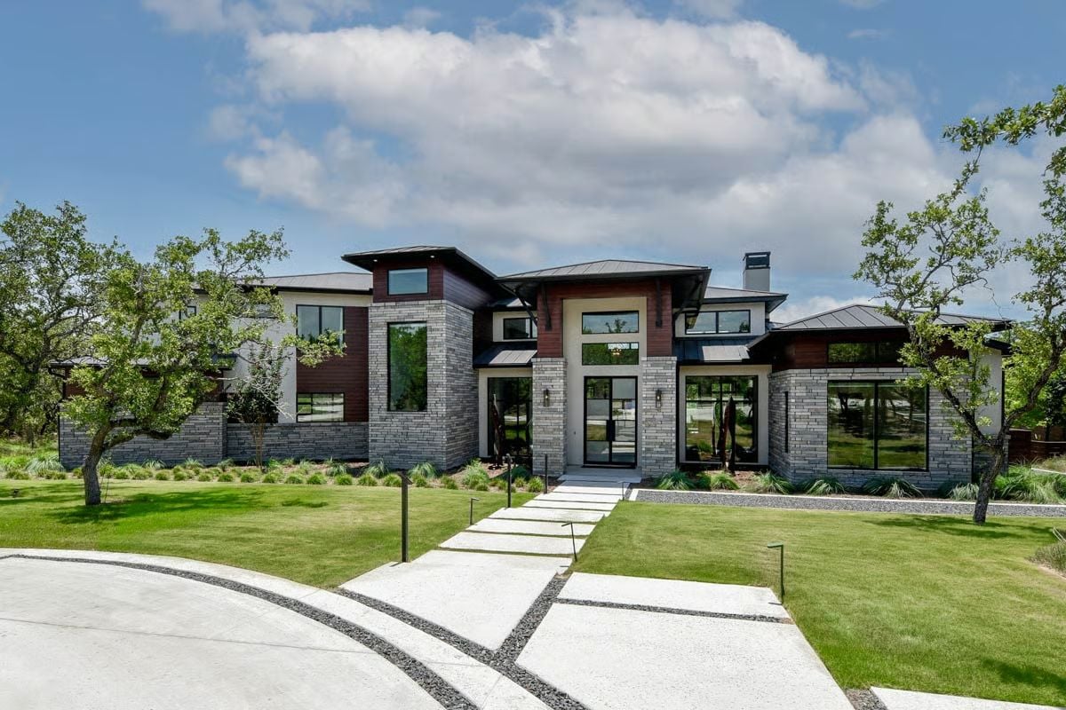5-Bedroom Modern-Style Home for a Wide Lot with Angled 3-Car Garage (Floor Plan)