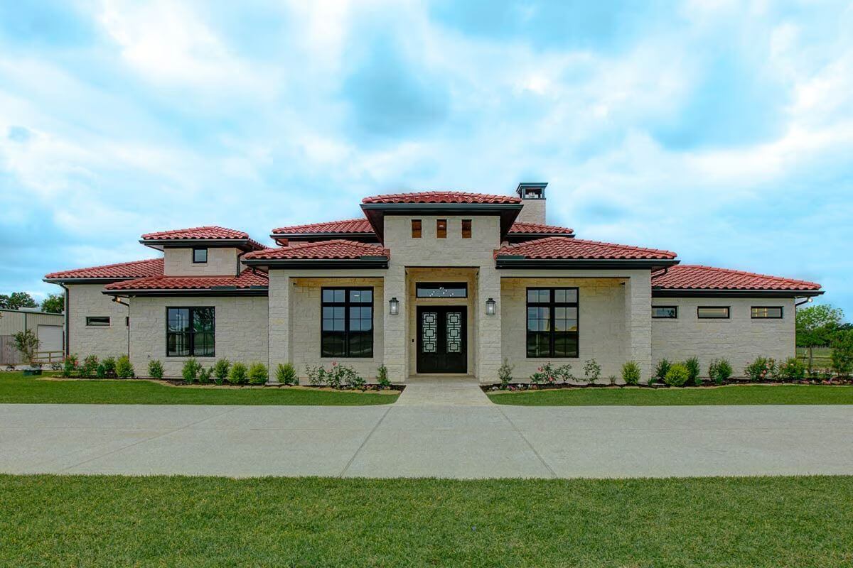 Mediterranean-Style 3-Bedroom Home with 8-Car Garage and Open-Concept Living (Floor Plan)