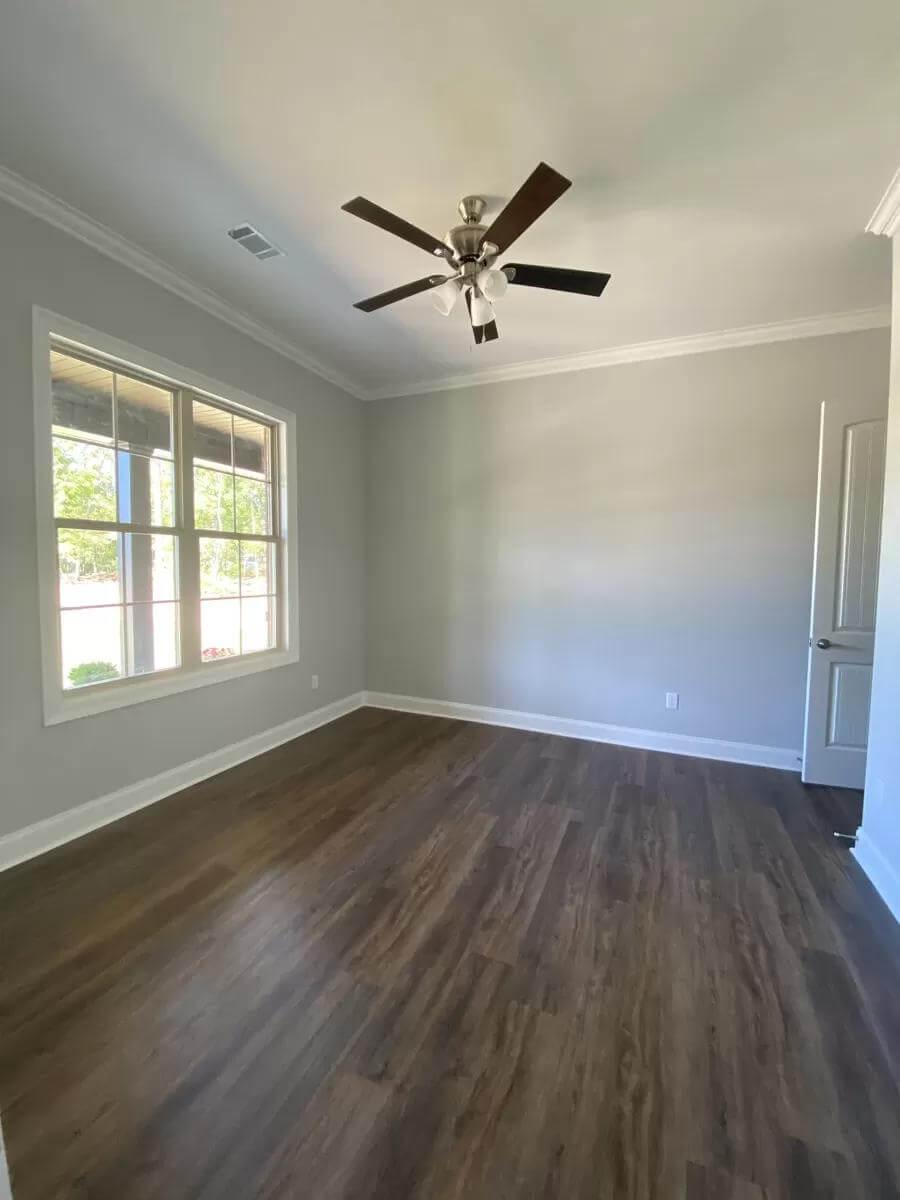 Simple Elegance in the Study with Hardwood Floors and Crown Molding