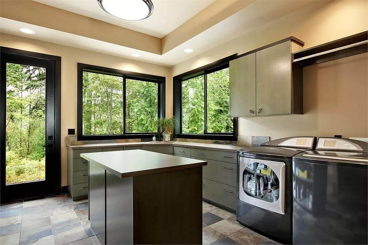 Utility Room Surrounded by Nature with Sleek Appliances