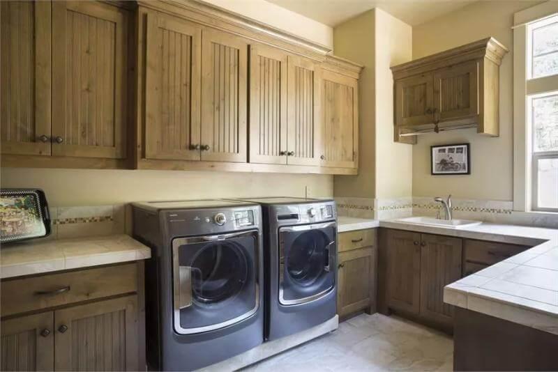 Laundry Room with Craftsman Touches and Functional Storage
