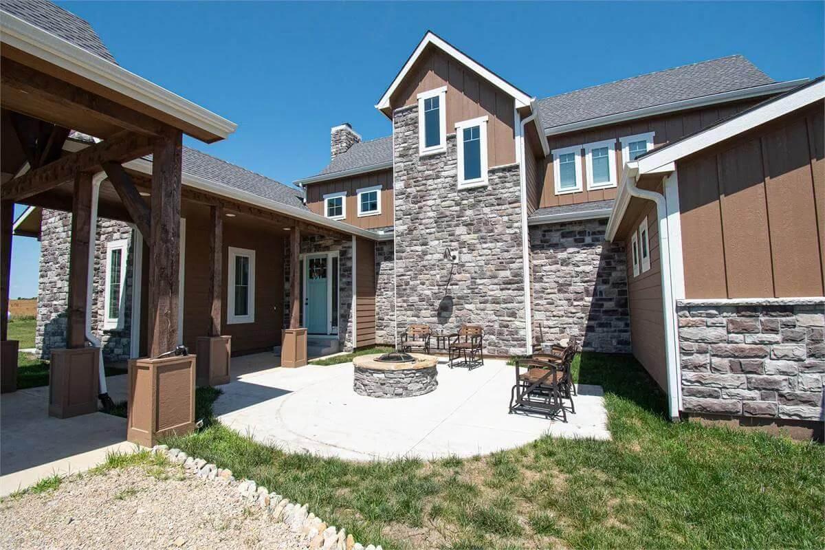 Enjoy the Outdoor Fire Pit Surrounded by Craftsman Stonework