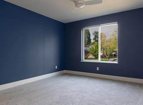 Explore the Bold Blue Walls in This Light-Filled Room