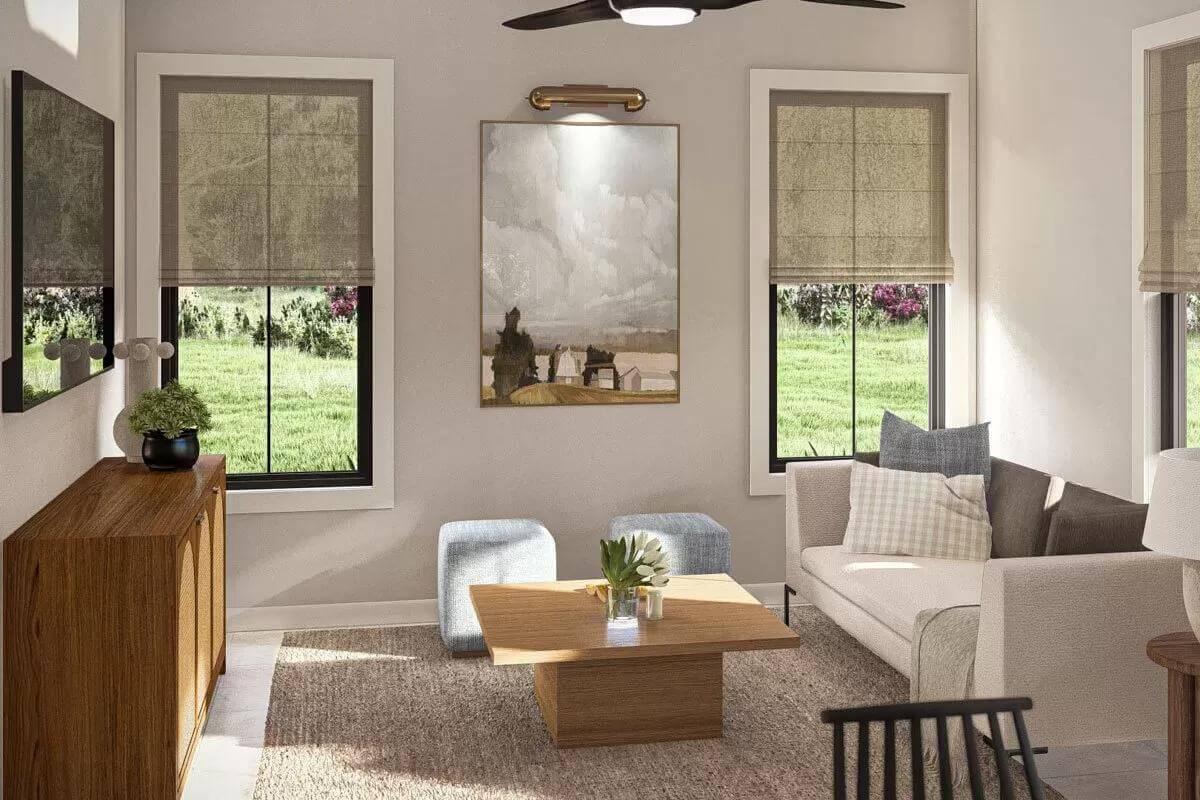 Modern Living Room with Landscape Art and Sleek Furnishings