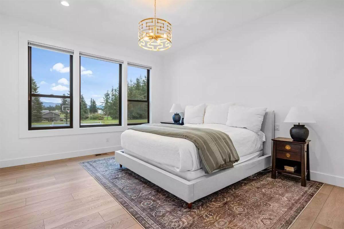 Serene Bedroom with a Modern Geometric Chandelier