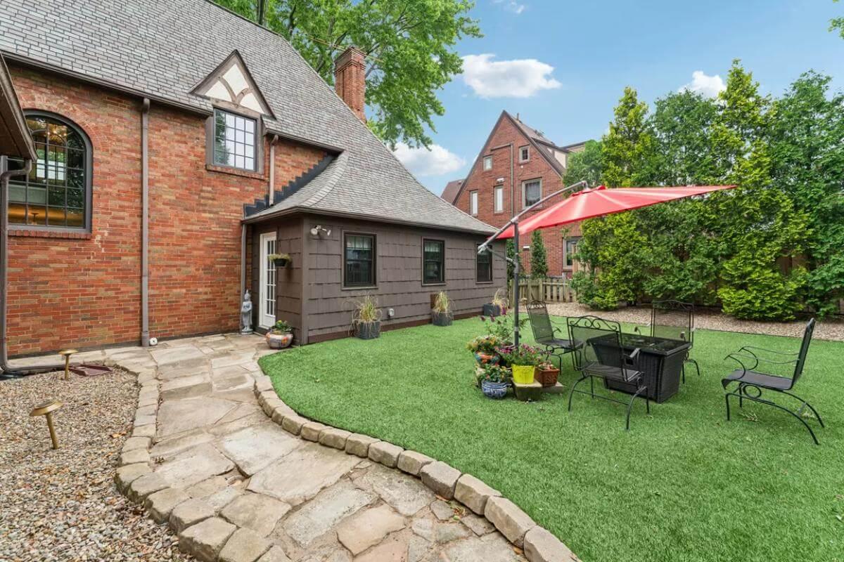Explore This Quaint Backyard with Tudor Accents