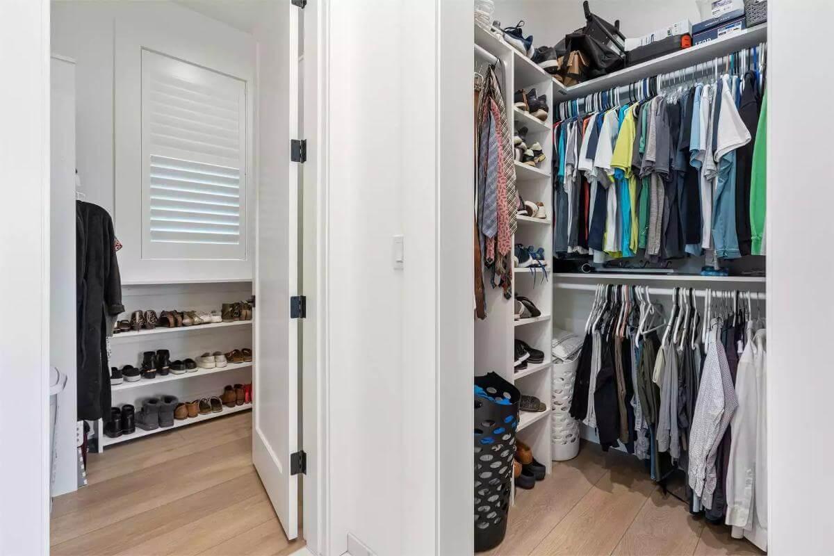 Explore This Organized Walk-In Closet with Practical Built-In Shelving