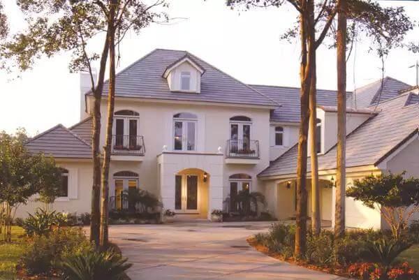 European Elegance with a Slate Roof and Arched Windows