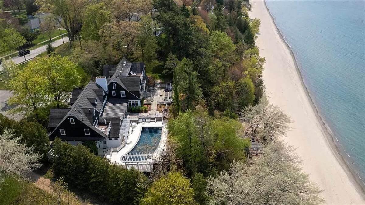 Beachfront Colonial with Lush Surroundings and Pool Oasis