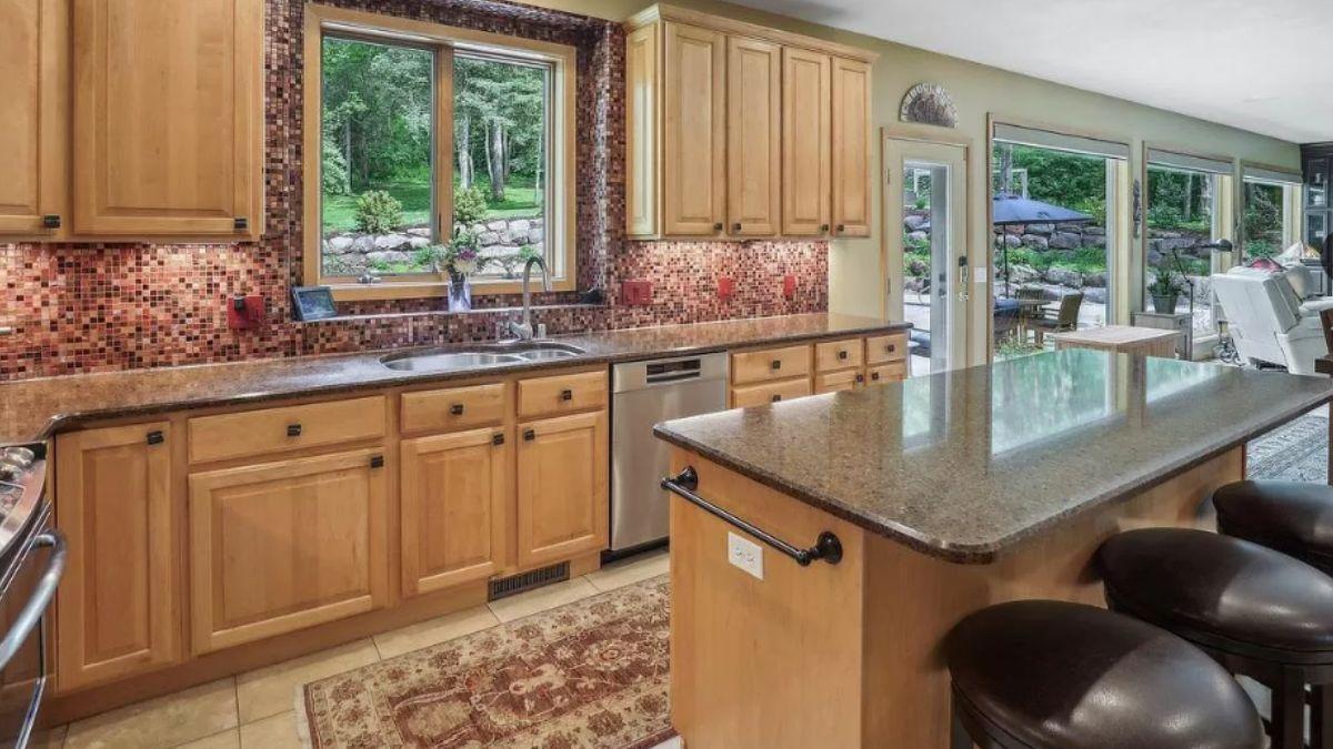 Craftsman Kitchen with Abundant Natural Light and Mosaic Accents