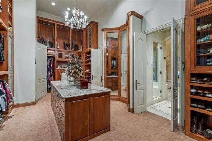 Step into This Lavish Walk-In Closet with a Marble Island