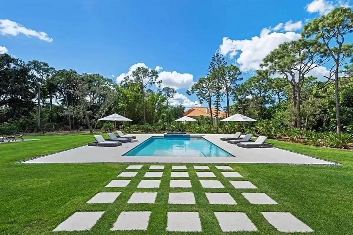 Notice the Modern Elegance of This Inviting Pool Area