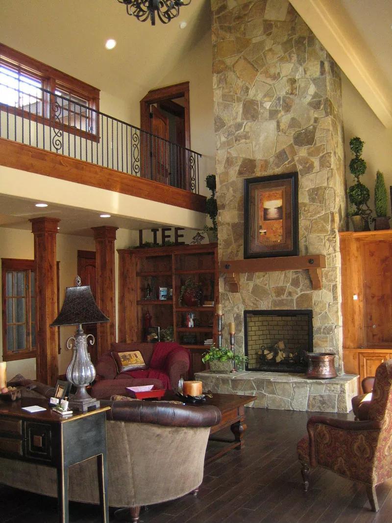 Wow, Check Out That Towering Stone Fireplace in the Heart of This Craftsman Living Room