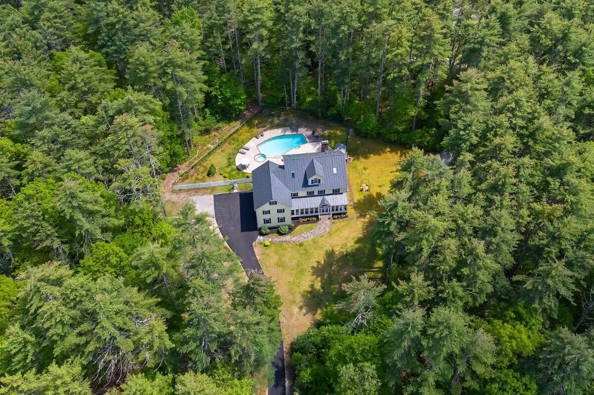 Explore This Secluded Colonial Retreat Nestled Amongst the Trees