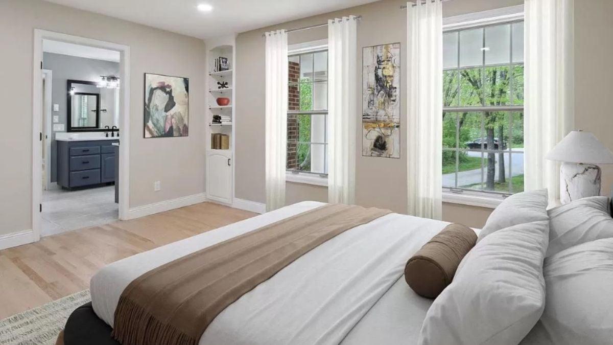Notice the Neutral Palettes and Cozy Reading Nook in This Bedroom