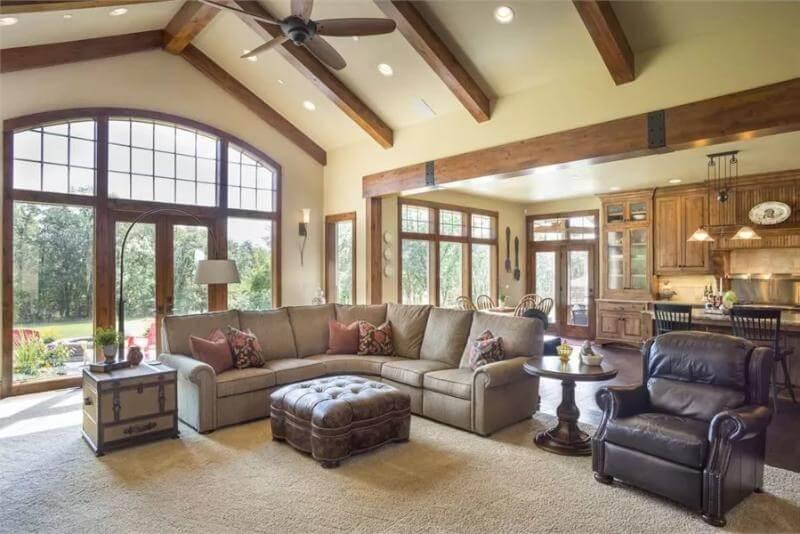 Marvel at the Wooden Beams and Open Concept in This Craftsman Living Space