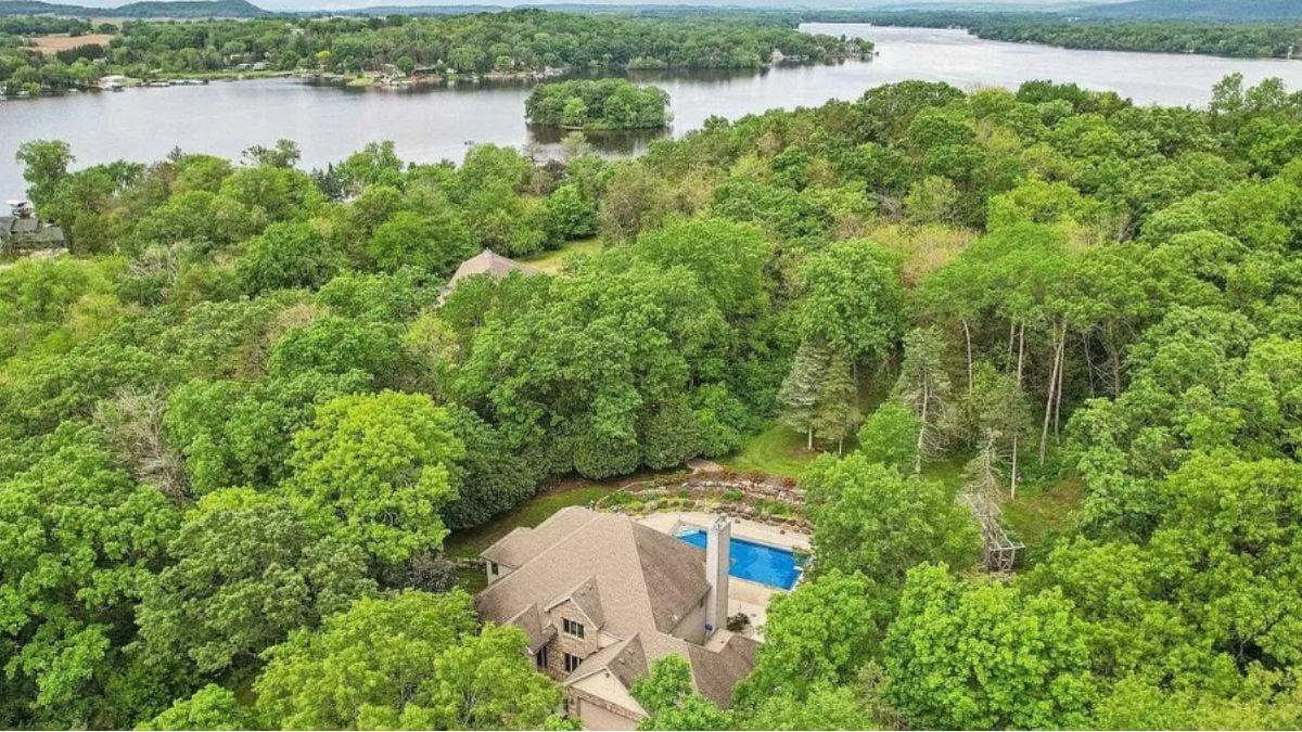 Majestic Craftsman Retreat with Woodland Surroundings and Lake Views