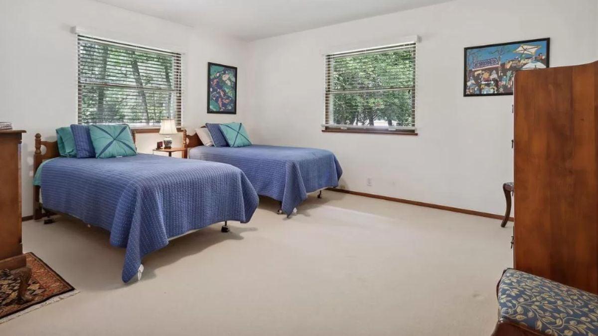 Twin Bedrooms with Garden Views and Nautical Hues