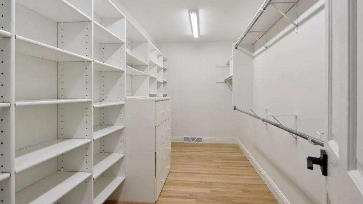 Explore the Spacious and Tidy Custom Storage in This Closet