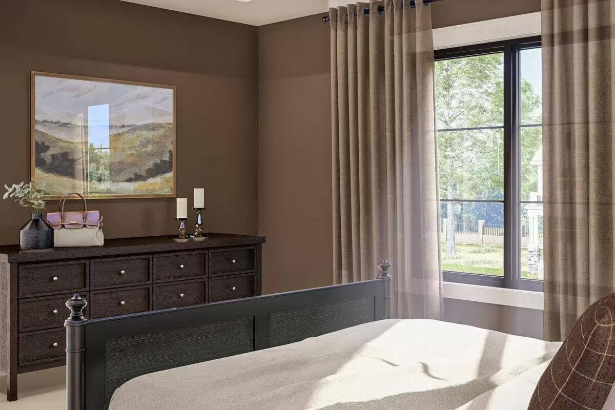 Cozy Bedroom with Dark Wood Elements and Garden Views