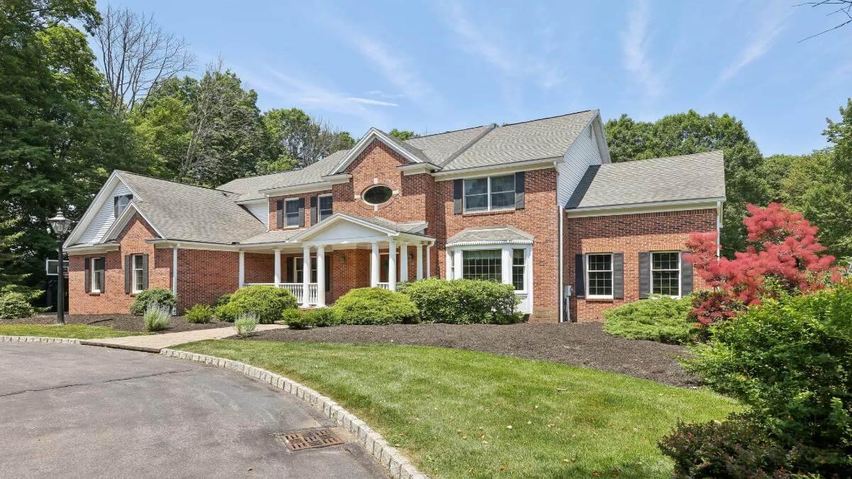 Classic Brick Facade with a Dash of Colonial Elegance