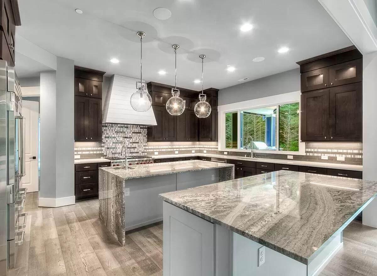 Explore the Contemporary Elegance of This Spacious Kitchen with Pendant Lighting