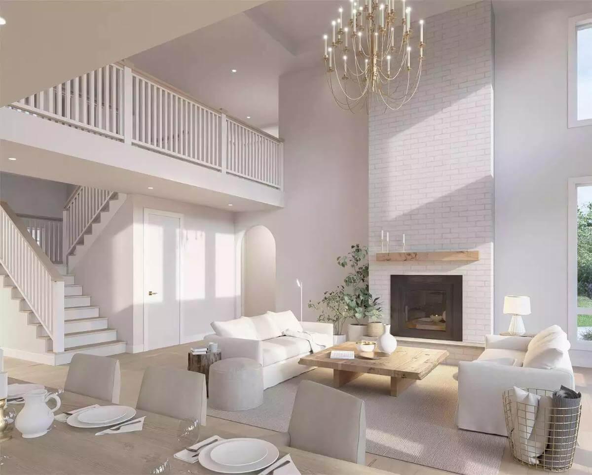 Bright Living Room with a Lofted View and Striking Chandelier