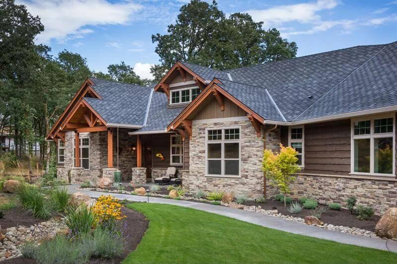 Stone and Wood Harmony in a Craftsman Front Elevation