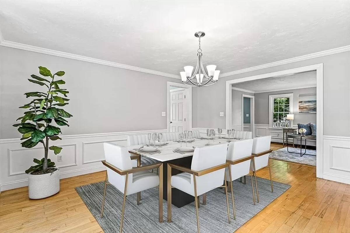 Sleek Dining Room with Modern Chairs and Classic Wainscoting
