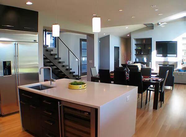Modern Craftsman Kitchen with Striking Island and Sleek Staircase