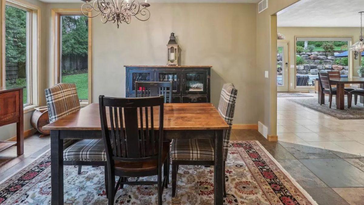 Charming Dining Area with a Blend of Textures and Views