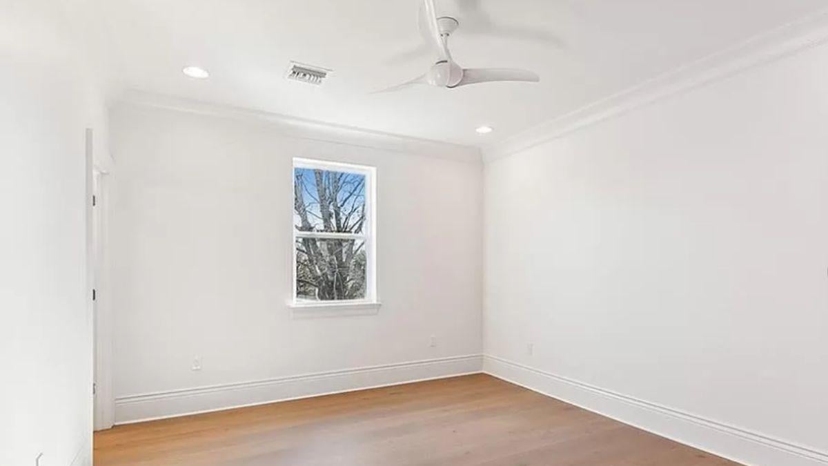 Sleek Simplicity: Notice the Clean Lines and Minimalist Ceiling Fan