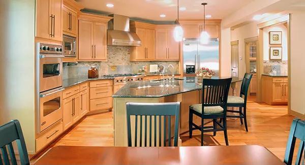 Spacious Kitchen with a Central Island and Warm Wood Cabinetry