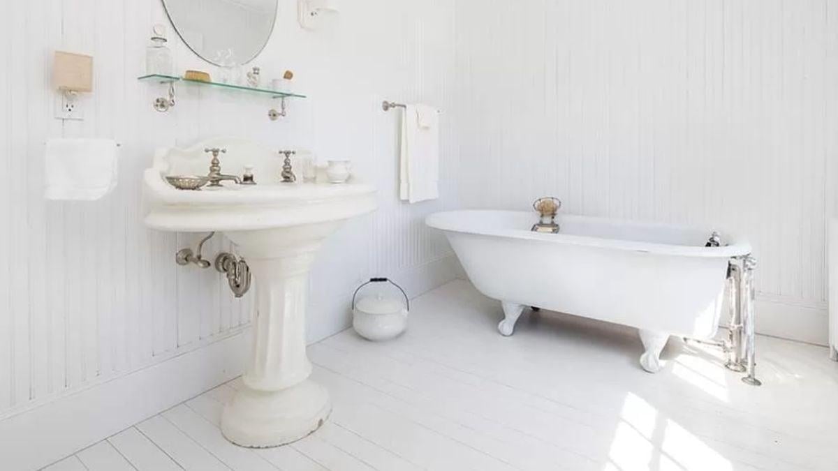Vintage White Bathroom with a Clawfoot Tub You Can