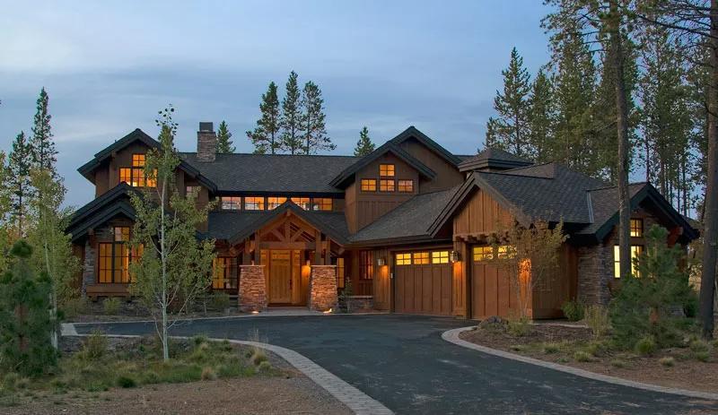 Craftsman Woodland Retreat with Striking Gables and Stone Accents